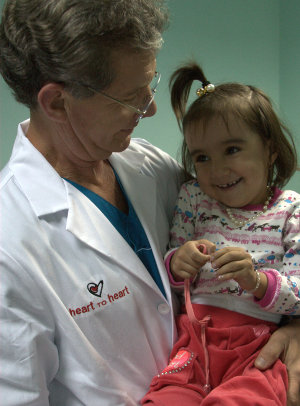 Dr. Young and a young patient in Russia
