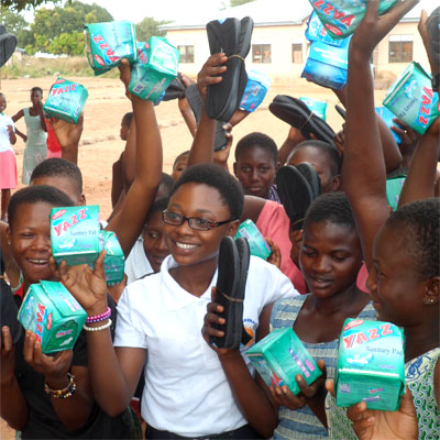 winnifred selby presents girls with sanitary supplies