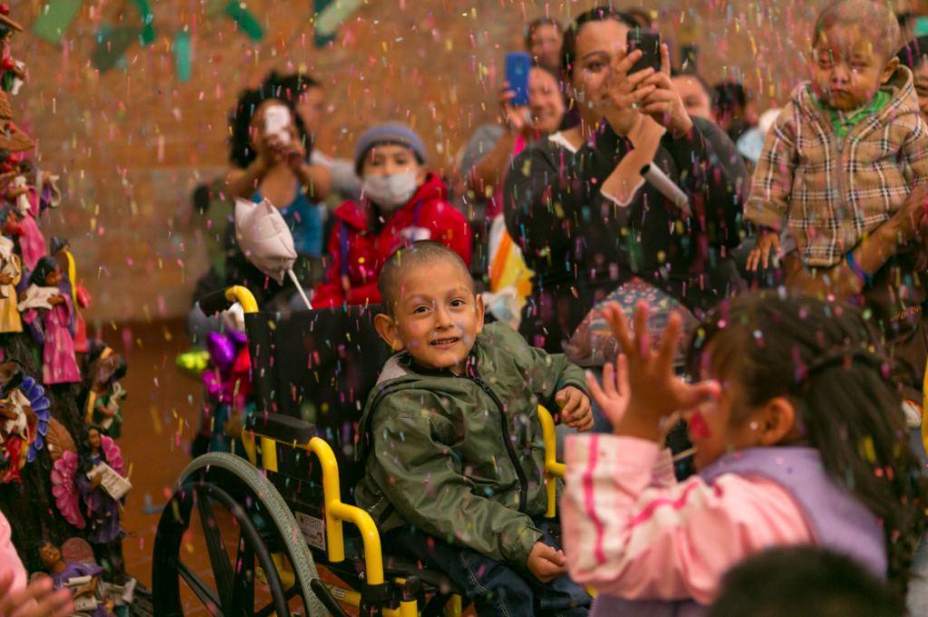 Children and their families celebrate a special day at Casa de la Amistad