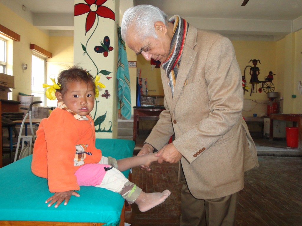 Dr. Banskota examining a child